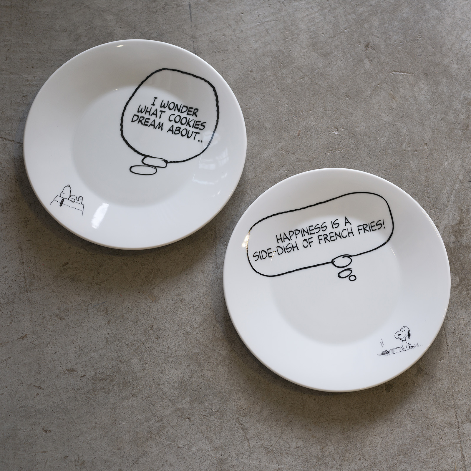 A photo of  “HAPPINESS IS A SIDE-DISH OF FRENCH FRIES Plate.”and “I WONDER WHAT COOKIES DREAM ABOUT Plate.”