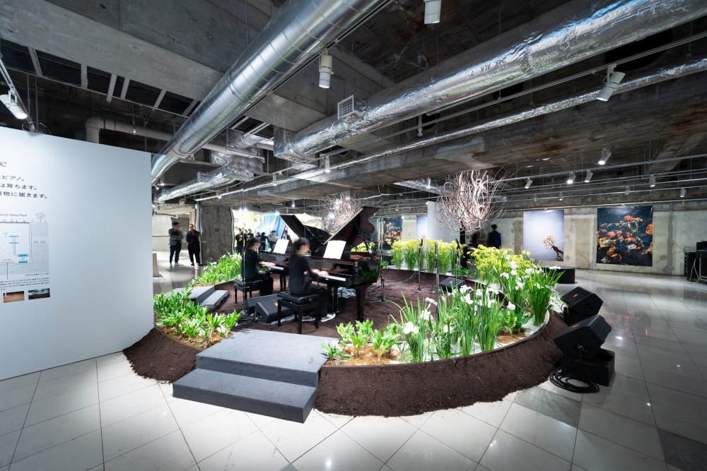 A grand piano in the middle of the flower installation in PARK B2/Basement 2